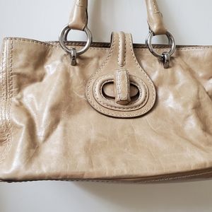 Beige leather rare Prada bag in great condition and lots of room.